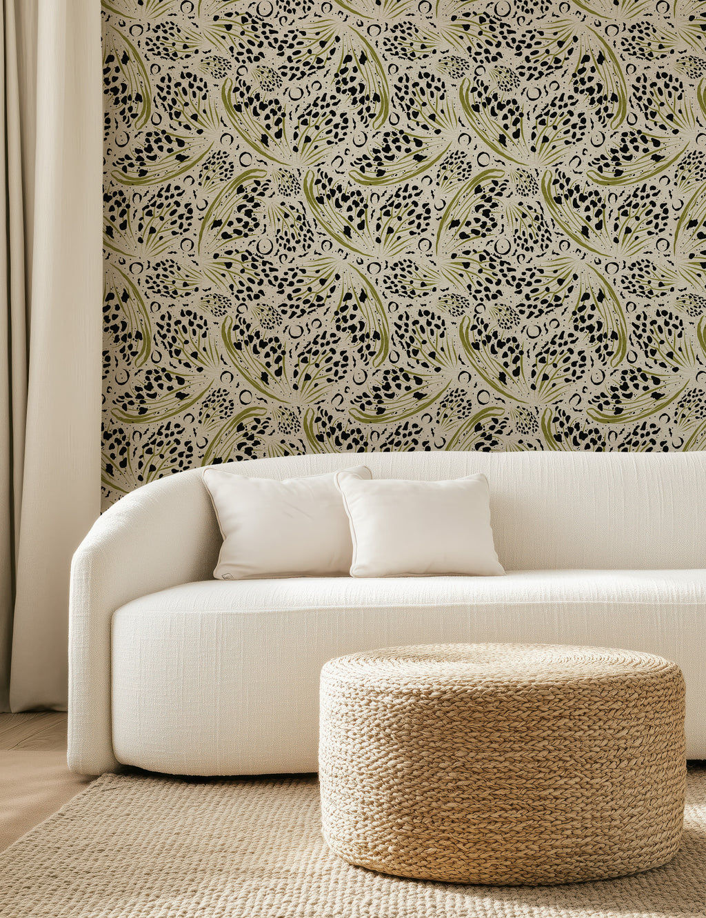 Abstract butterfly wallpaper pattern with expressive, painterly forms arranged in a dynamic, modern composition, creating a light yet bold statement for pattern-rich interiors. Beige cream tan background with black and green.  Living room with white sofa